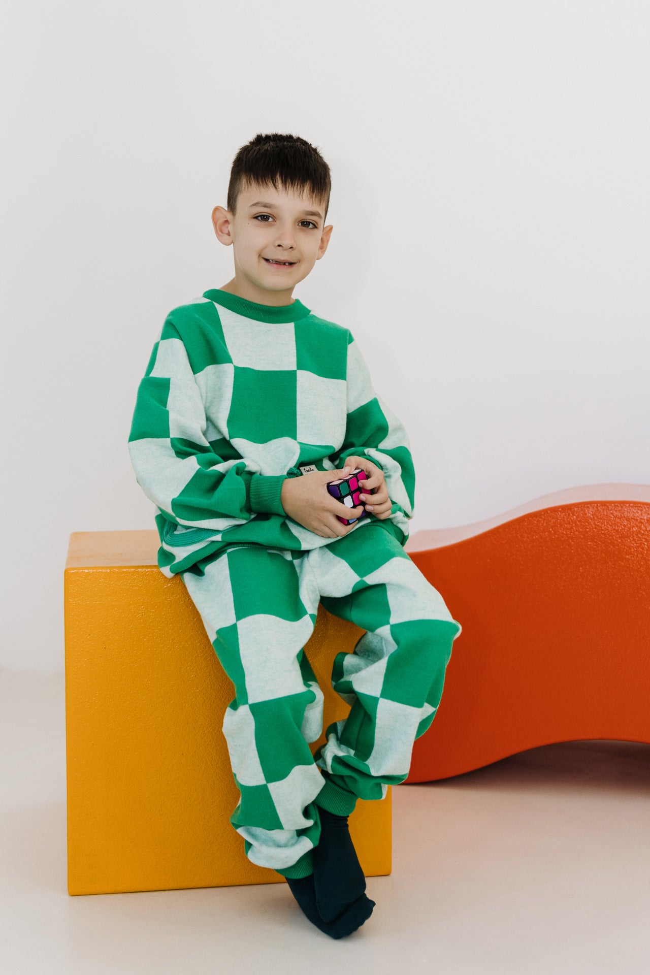 Zöld kockás pulcsi