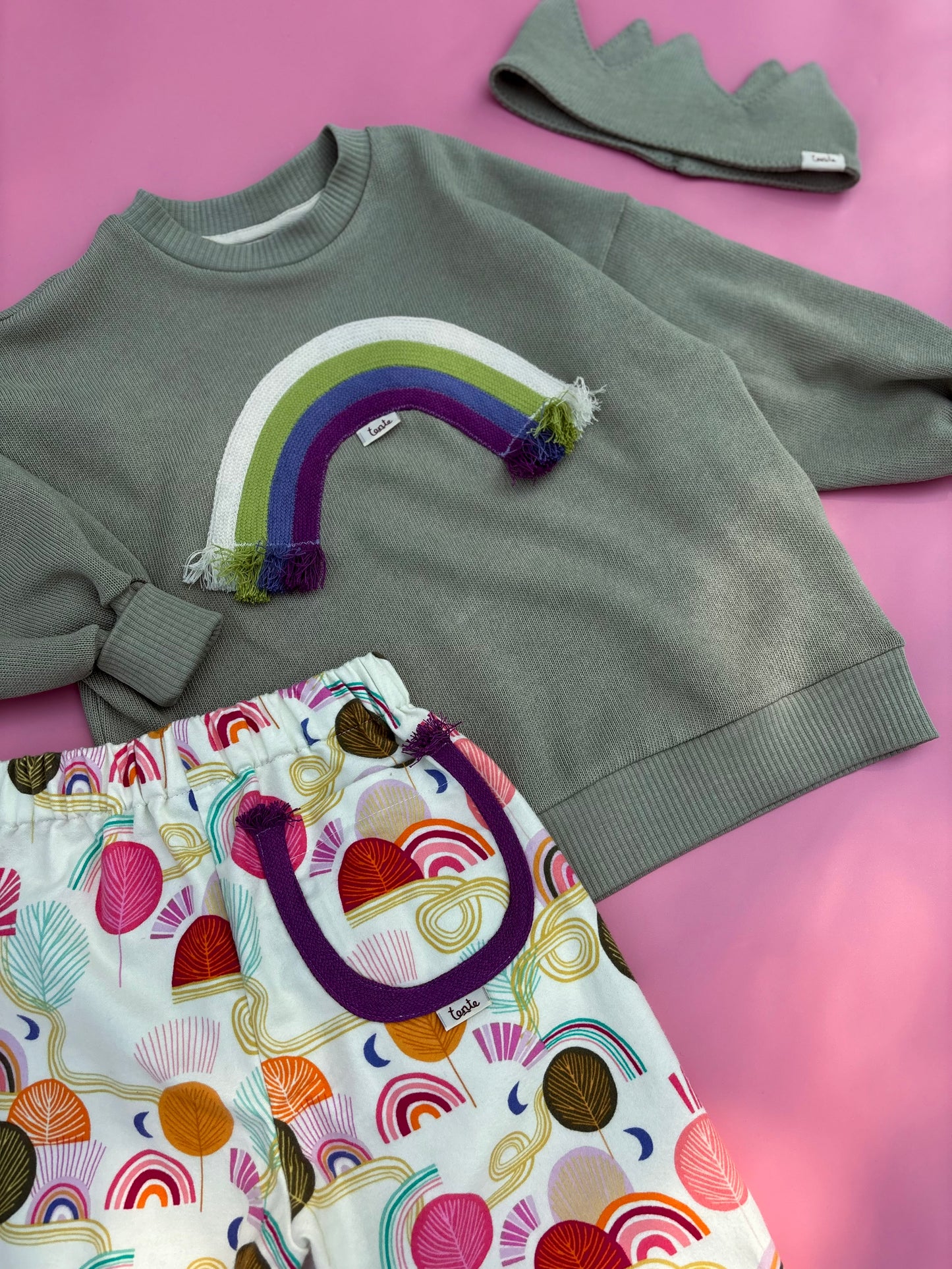 Green rainbow sweater
