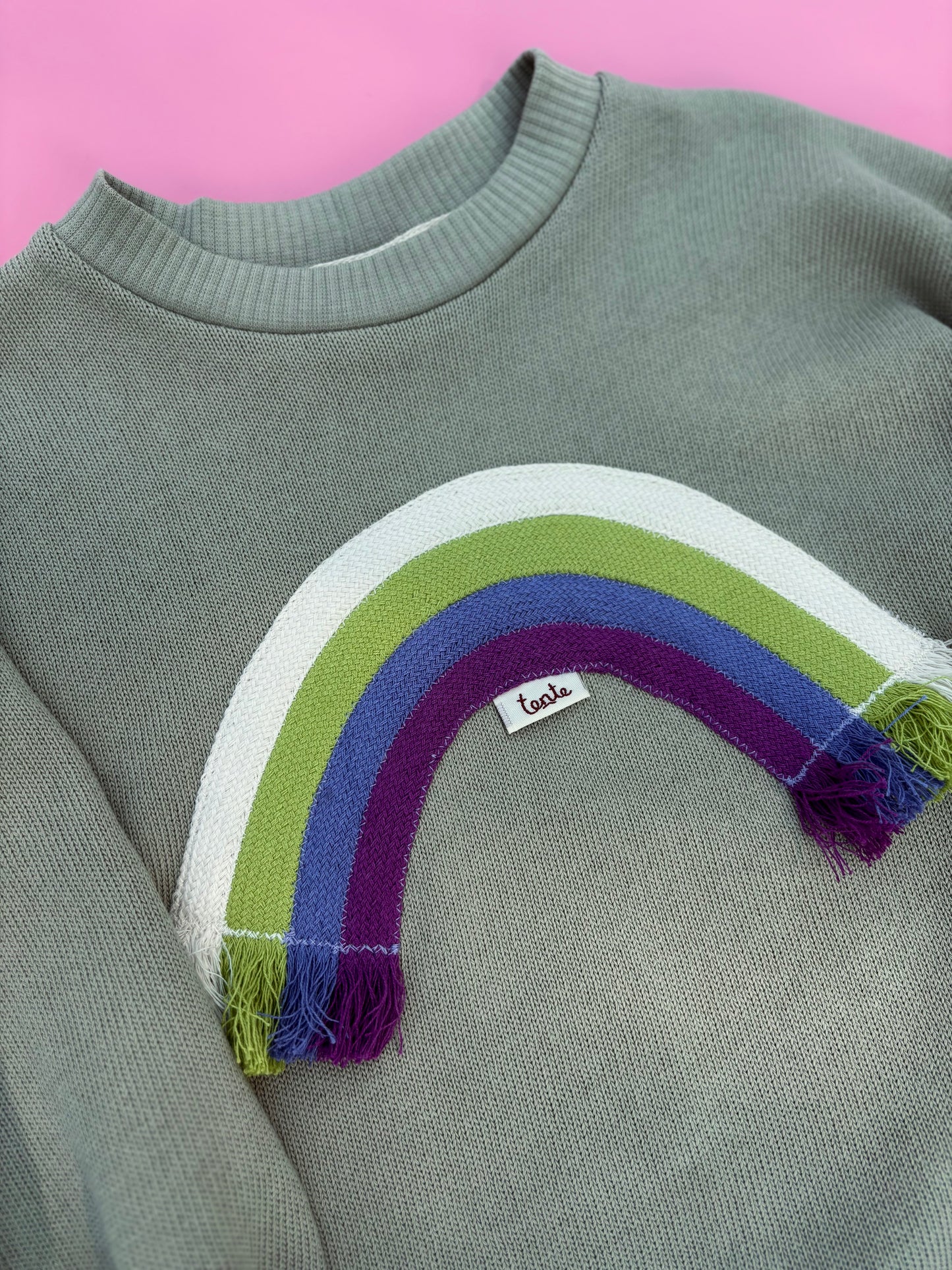 Green rainbow sweater