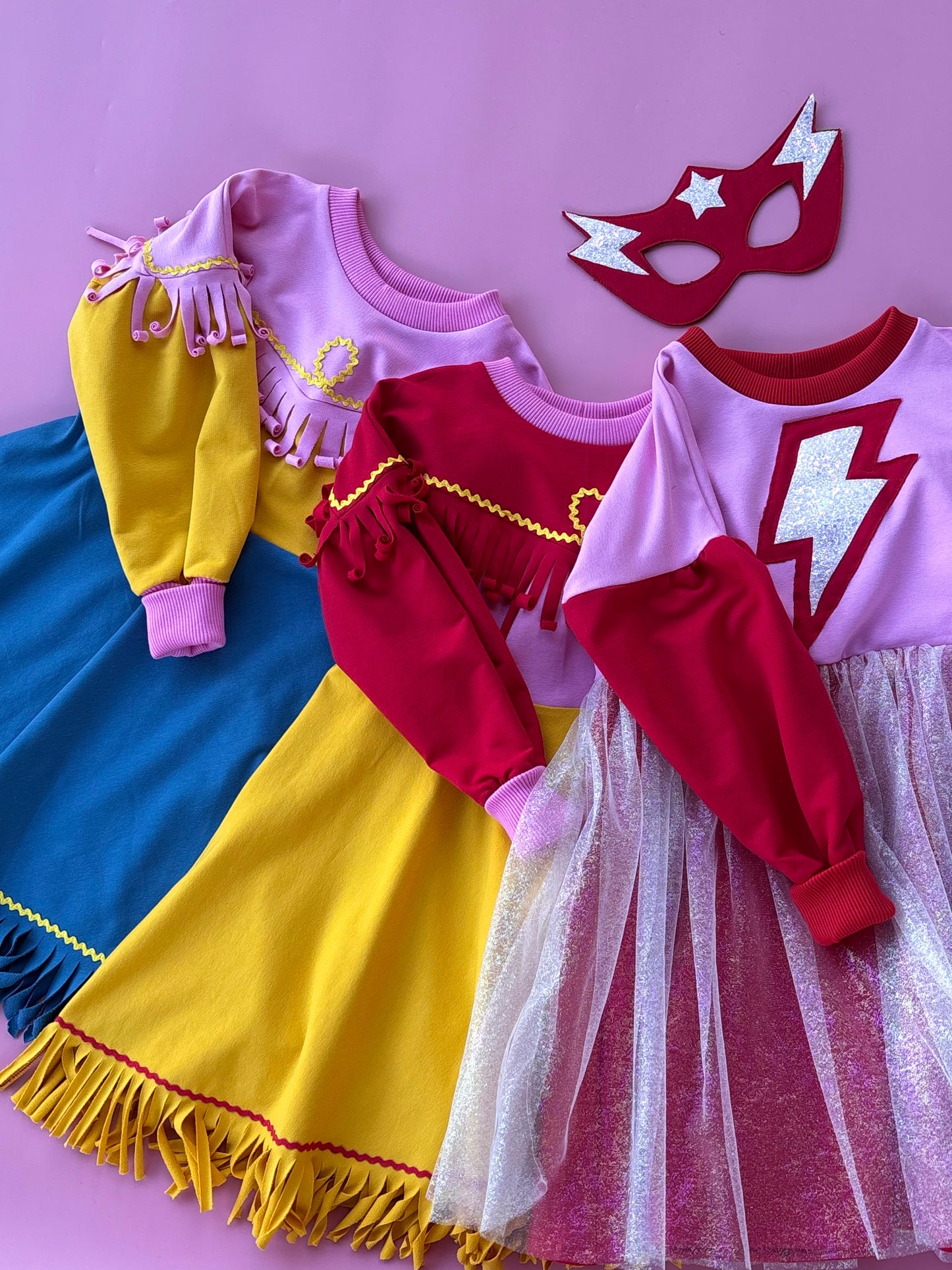 Supergirl red-pink dress