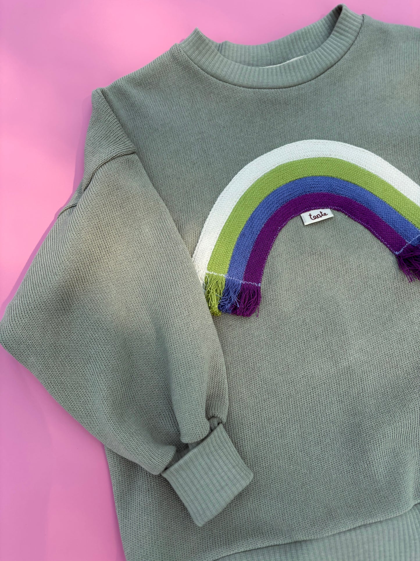 Green rainbow sweater