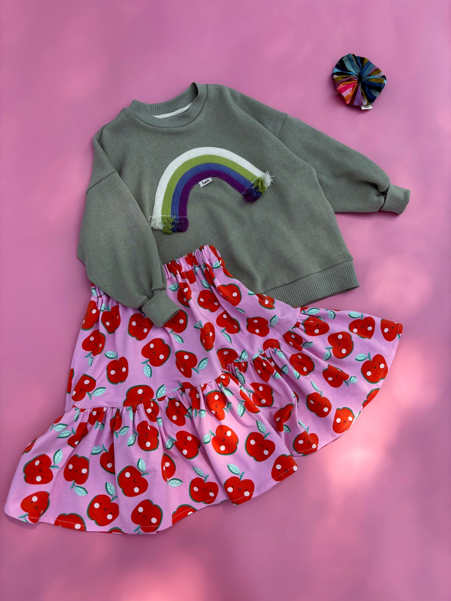 Green rainbow sweater