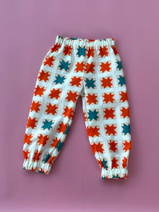 Narancs csillagos nadrág