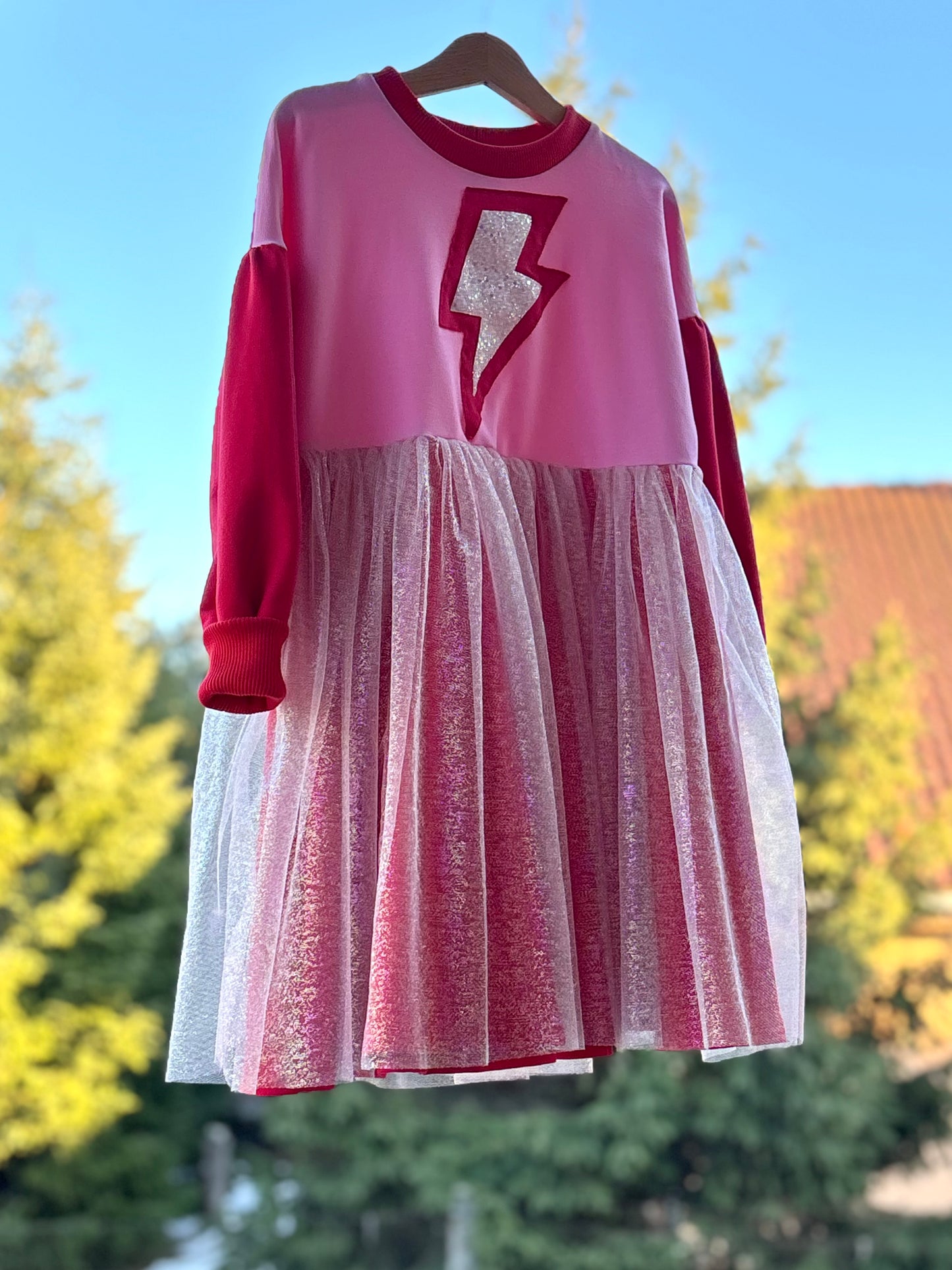 Supergirl red-pink dress