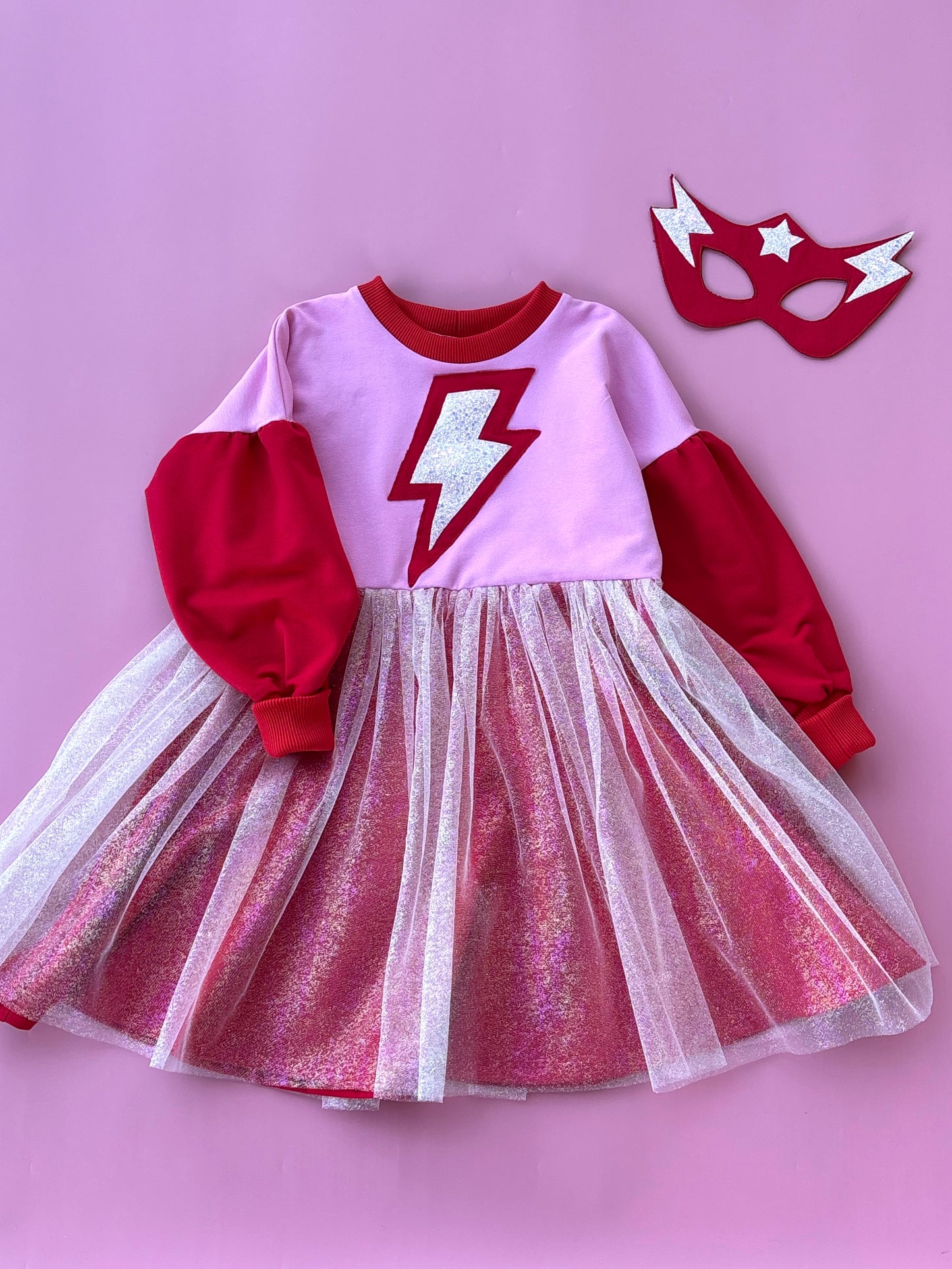 Supergirl red-pink dress