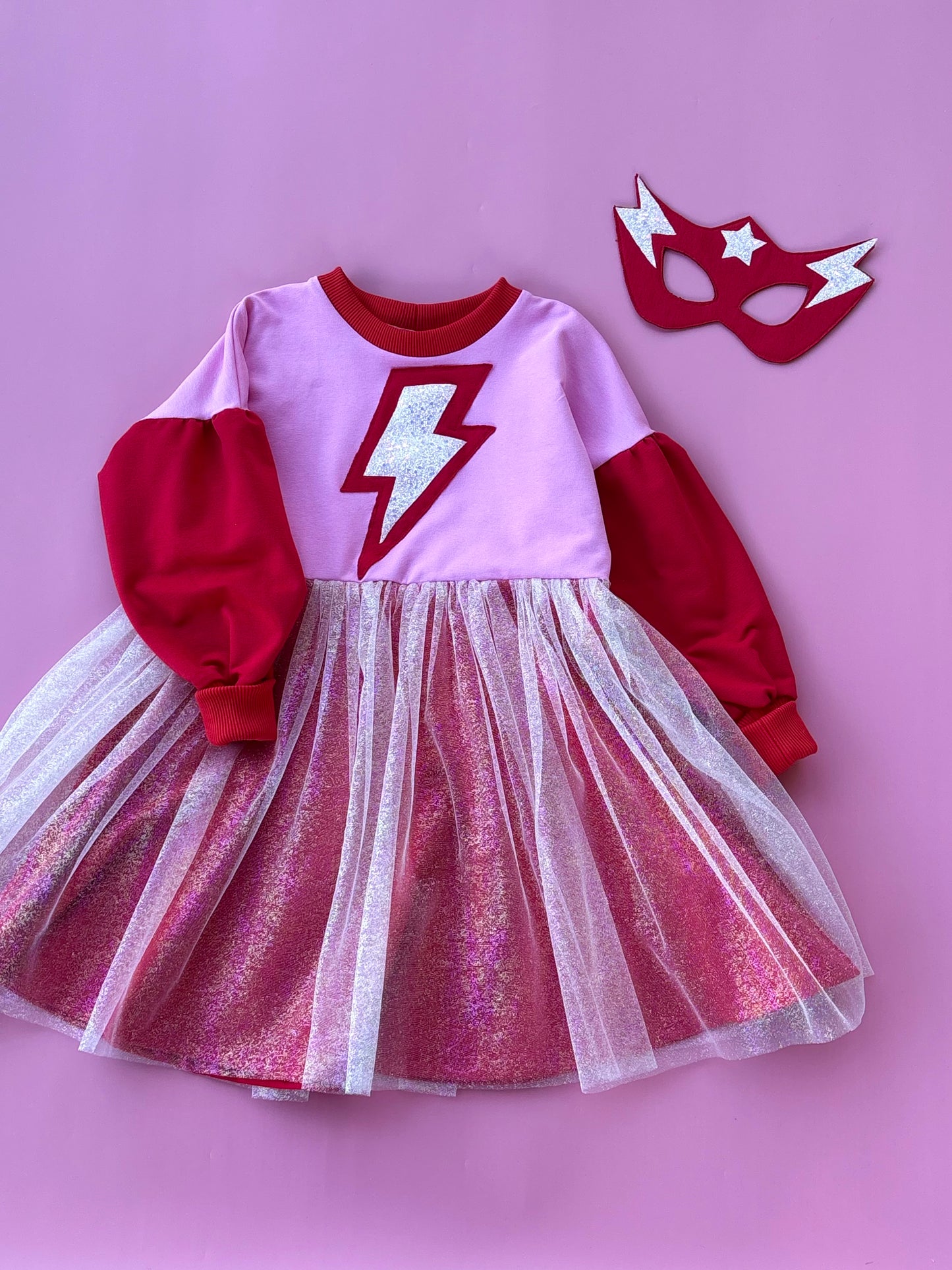 Supergirl red-pink dress