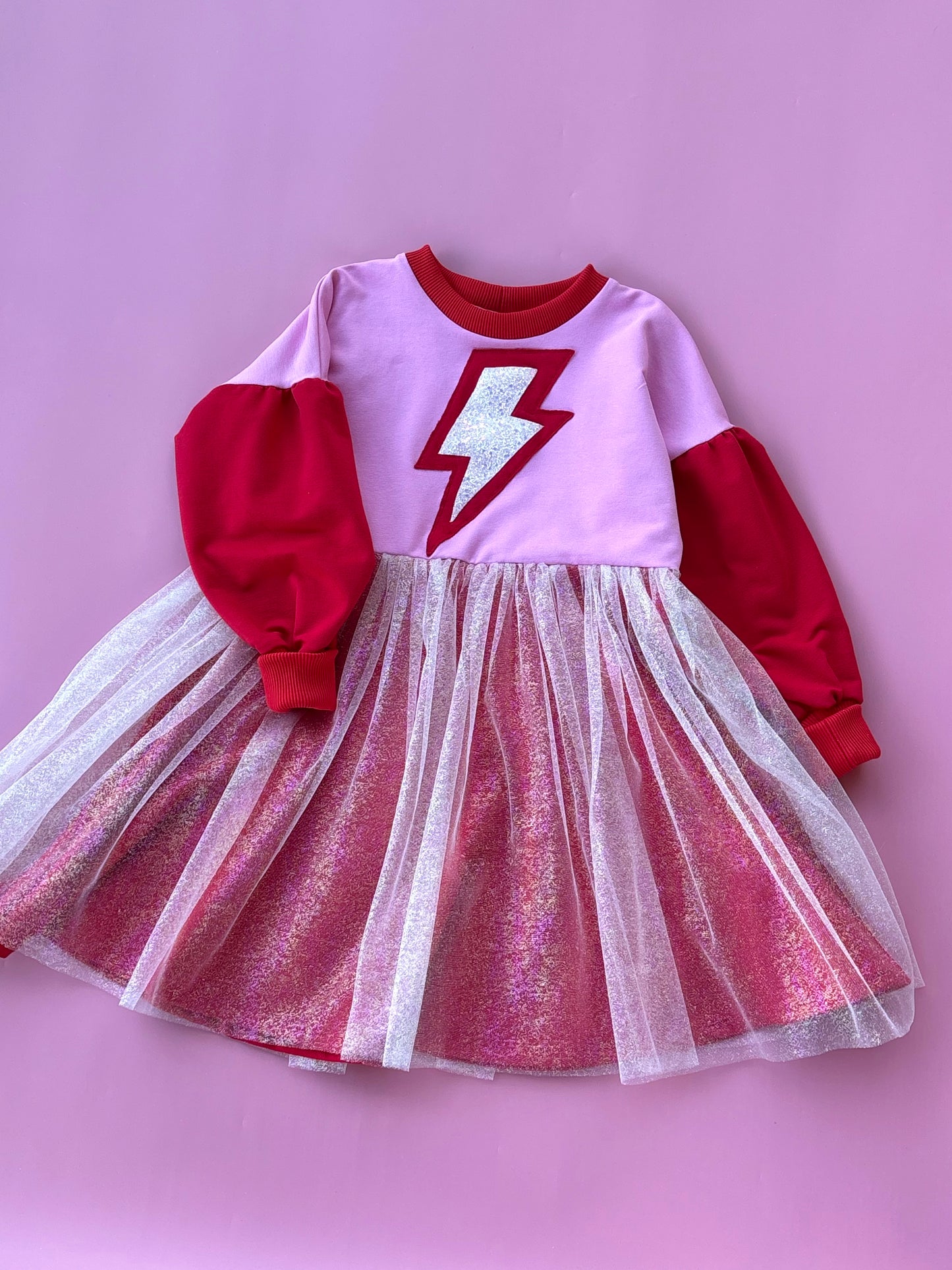 Supergirl red-pink dress