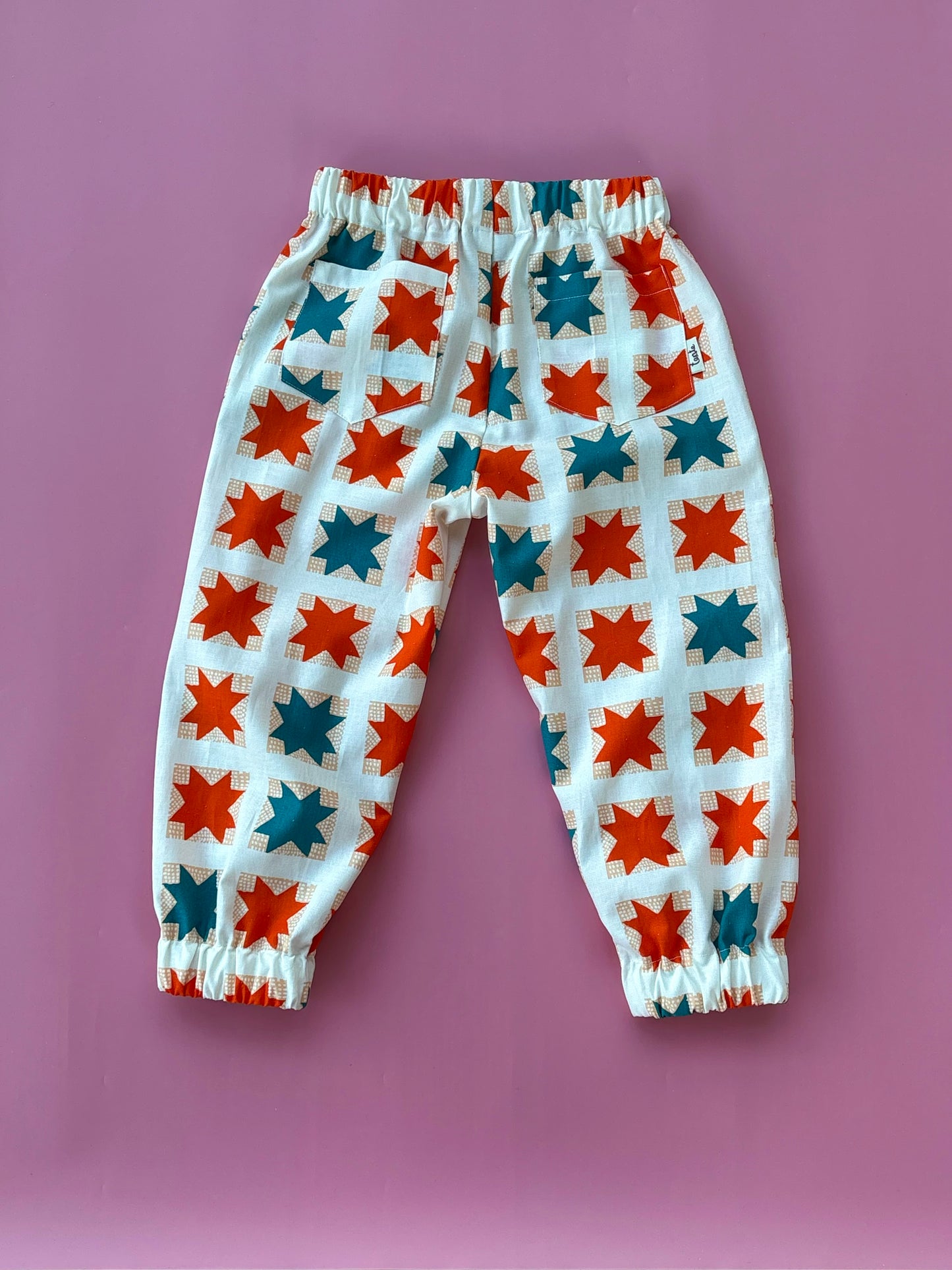 Narancs csillagos nadrág